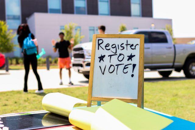 Ariel DeSantiago/The Collegian A table on NW Campus gives students the opportunity to get registered to vote.