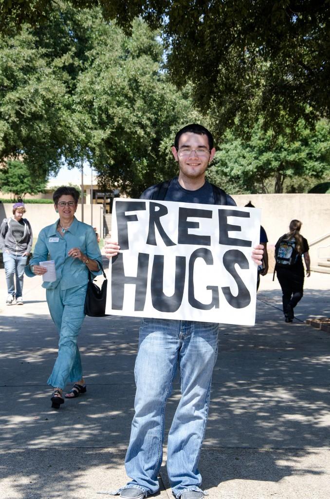 On NE Campus, Yoseph Mohmand offers free hugs between classes Sept. 24. “I lost count after 100,” he said. “There were too many hugs back-to-back.”
David Reid/The Collegian