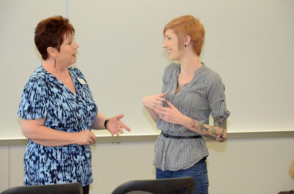Cynthia Savage talks with student Lindsey Berry during her behavior management and modification class. The course is part of a two-year program that certifies students to become state-licensed chemical dependency counselors.
David Reid/The Collegian