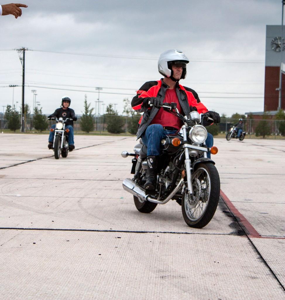 Student Tom Reed rides the range on NW Campus. The motorcycle licensing program aims for safety and fun.  
Carrie Duke/The Collegian