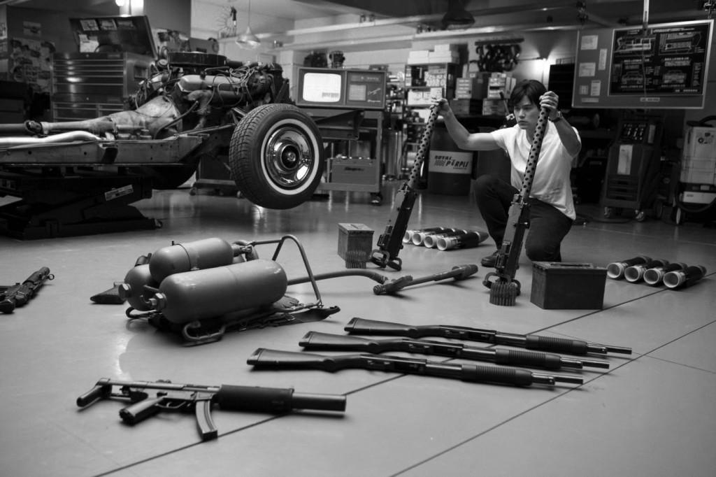 Kato arranges heavy weaponry for installation in Black Beauty, the car used in the new film The Green Hornet. 
Photos courtesy Columbia Pictures