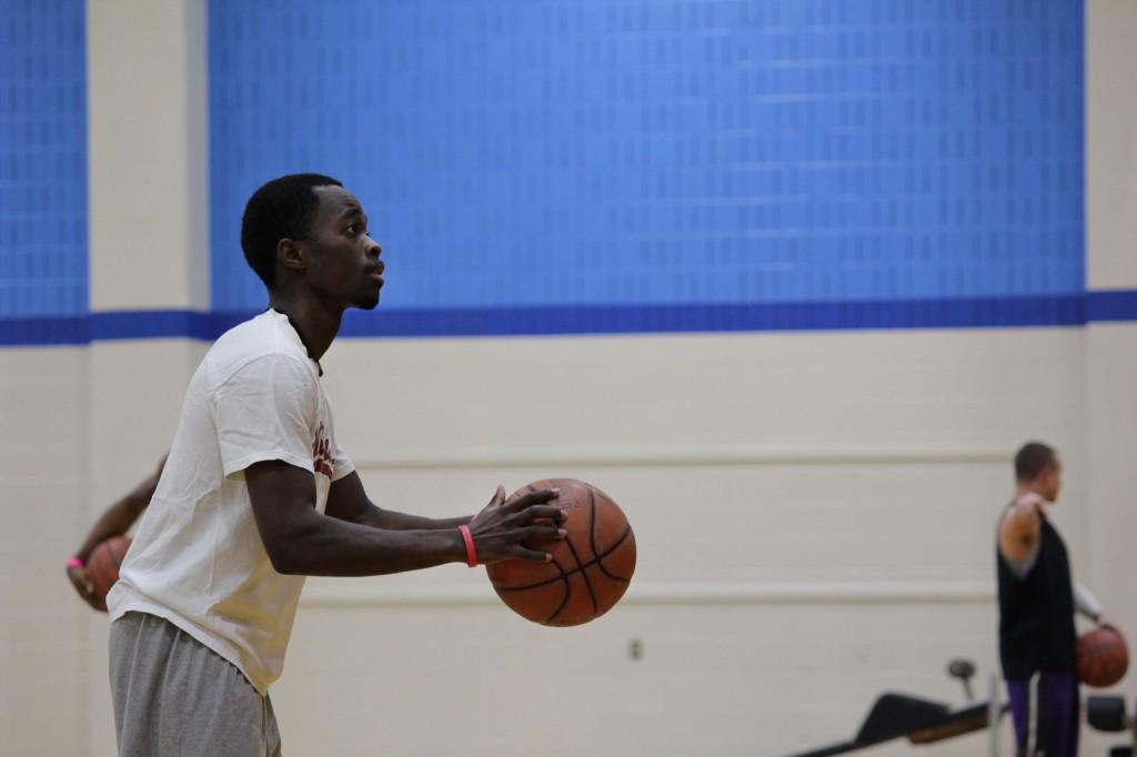 NE student Raymond Watanga practices shooting hoops in the NE gym. TCC fitness centers are open to all current students and employees. 
Zach Estrada/The Collegian