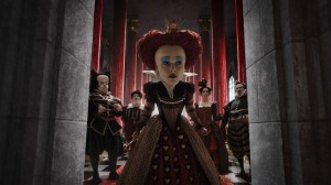 Helena Bonham Carter portrays the Red Queen at the head of her court in Tim Burton’s twist on Lewis Carroll’s iconic classic children’s story Alice in Wonderland. Photo courtesy Walt Disney Studios