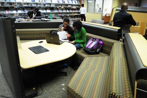 SE Campus students Royce Vigne and Stephanie Gaskin take time to study on the new furniture located in the SE library.  Alice Hale/The Collegian