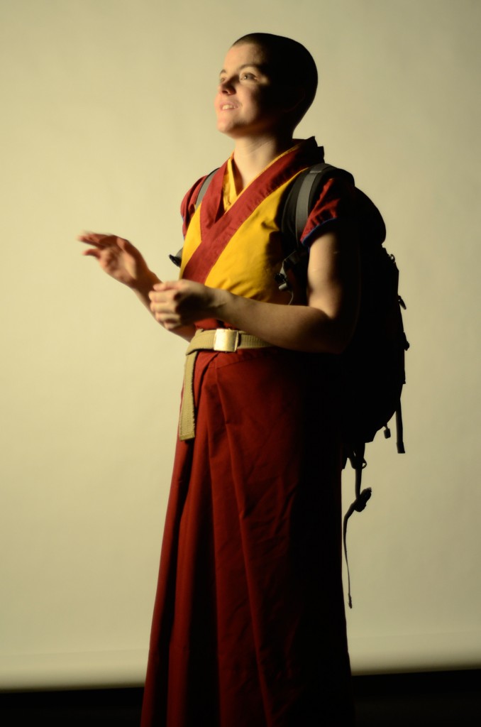 NE student Kelsang Drolje, an ordained Buddhist, wears a backpack along with a set of her robes. Symbolism is a strong component of the Buddhist faith. Photo by Georgia Phillips/The Collegian