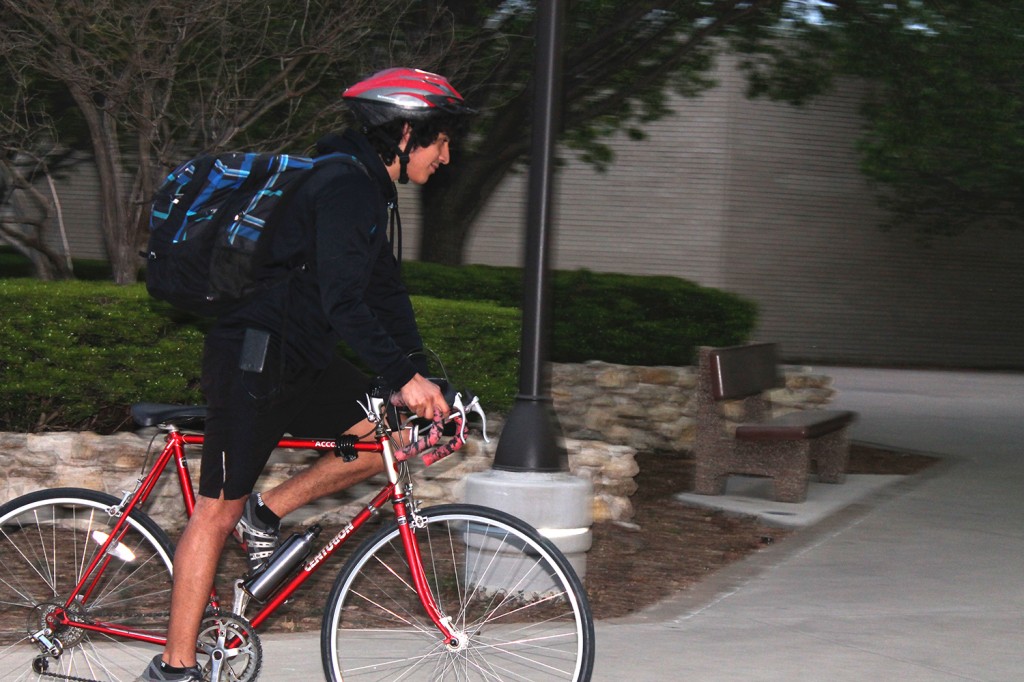 NW student Mario Monterroso says he enjoys riding his bike to school and would like to see more  bikes in the bike racks. Photo by Haylie Jones/The Collegian