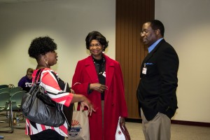 Keynote speaker Nikki Chriesman, president of the L. Clifford Davis Legal Association, talks with attorney and South adjunct instructor Faye Watson and South president Peter Jordan during a networking break.  