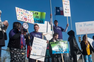 TR Campus’ TREE club members, friends, family and TCC advisors stand on the streetside of the Rainbow Lounge in Fort Worth during a morning rally March 25. Photos by Jayci Gillie / The Collegian