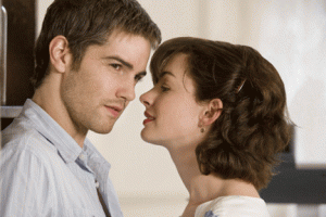 Dexter (Jim Sturgess) pretends not to be interested in Emma (Anne Hathaway) trying to kiss him, but he’s not fooling anyone. This shot takes place long after One Day’s conflict is resolved. Photo courtesy Focus Features