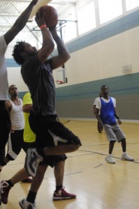 SE student Courtney Khouri drives the lane for a layup in the SE intramural tournament. Buckets toppled three opponents on their way to winning the crown. Photos by Jayci Gillie
