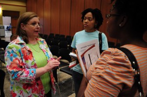 SE counselor Michelle Faith talks with students following her presentation The Silent Epidemic April 22 on SE Campus. Faith discussed ways to help people who are depressed and contemplating suicide. Alice Hale/The Collegian