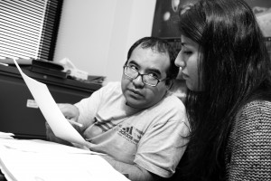 Math lab tutor Mike Manzanares assists student Mina Naem with her work in the NE Campus lab. Students can access math Web sites and practice tests as well as receive one-on-one tutoring through the math labs that can be found on all five campuses.  Photo by Casey Holder/The Collegian