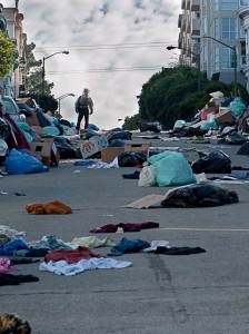 Alan Krumwiede (Jude Law) walks through San Francisco in Contagion. The city is deserted and, for some reason, trashed. Photo courtesy Warner Bros. Pictures 