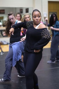 Chelsey Johnson gets her groove on with the other students.  Photo by Yesenia Santillan/The Collegian