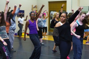 Nobody puts these babies in the corner! Eboni Ivery and Chelsey Johnson participate in the dance class taught Sept. 18 by former TCC student Brandon Mason, who returned from New York to teach a week of intensive dance classes on NW Campus.  Photo by Yesenia Santillan/The Collegian