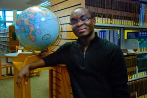 Edmund Tamakloe, who has worked in the SE Campus library since 2007, is currently writing a book about his experiences as a war victim in Africa.  Photo by Taurence Williams/The Collegian