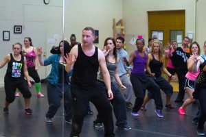 Former TCC student Brandon Mason instructs a week of dance courses where students could sign up for free to learn about hip-hop and ballet. After Mason left TCC, he was successful in New York and Los Angeles. Amy Sleigh, NW associate dance professor, said Mason was one of the first to return to NW as an alumnus during the 15 years of the NW dance program.  Photo by Yesenia Santillan/The Collegian