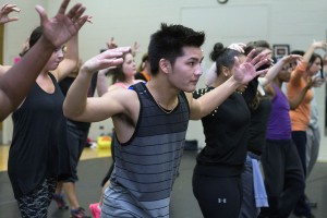 NW student Paul Asyn practices the dance moves created by Brandon Mason during the class.  Photo by Yesenia Santillan/The Collegian