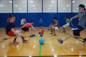 Students scramble toward the dodgeballs during the tournament on NE Campus Sept. 27. The Green Giants won the tournament.  Photo by Taurence Williams/The Collegian