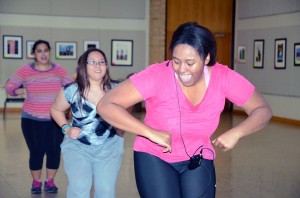 Jessica Woods, a dietary major on NE Campus and a certified Zumba instructor, leads a class 2:30-3:30 p.m. in NSTU Center Corner every Monday through Nov. 4.  Photo by Georgia Phillips/The Collegian