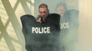 District police practice carrying bat shields during a training session. The shields, which look like a bat wing, provide maximum protection, repels rounds of bullets in case of gunfire and allows officers to hold their guns with both hands.  Photo courtesy TCC police