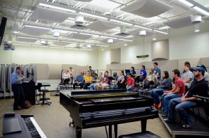 Music instructor Warren Dewey teaches class in the choir room, where the ceiling was raised as part of the NE music renovations.  Photo by Georgia Phillips/The Collegian