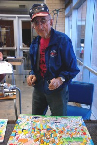 Now 96, Belpusi keeps his art alive on NW.  Photo by Taurence Williams/The Collegian