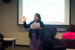 SE counselor Carisa Bustillos-Givens delivers her speech on stress relief to students Oct. 16.  Photo by Yesenia Santillan/The Collegian