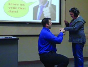 NE student Luke Landreville proposes to his girlfriend Marika Boudreaux during his Fundamentals of Speech class Nov. 18.   Photo courtesy Deanna Roskop