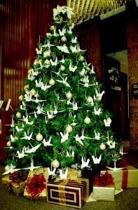 A Christmas tree in the South Campus library is decorated with origami cranes, made by student Anh Duong, who works in the library.  Photo by Brian Koenig/The Collegian