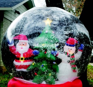A snow globe decorates one yard in Arlington’s Interlochen neighborhood.  Photo by Ashley Brocato/The Collegian