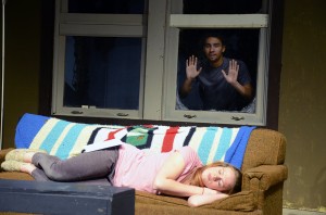 Kirkpatrick’s character Sheena sleeps while her stalker, played by Cummings, watches her. South drama instructor Richard Haratine directs the comedy.  Photo by Georgia Phillips/The Collegian
