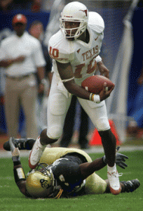 Vince Young, 10, shows moves against opponents this year as quarterback of the national champions in college football, The University of Texas, which beat University of Southern California in the Rose Bowl.  Photo courtesy University of Texas