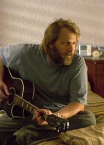 Jeff Daniels portrays a blind, guitar-playing man whose roommate is persuaded to participate in a bank robbery. The movie ’s first half offers character development.  Photo courtesy Miramax