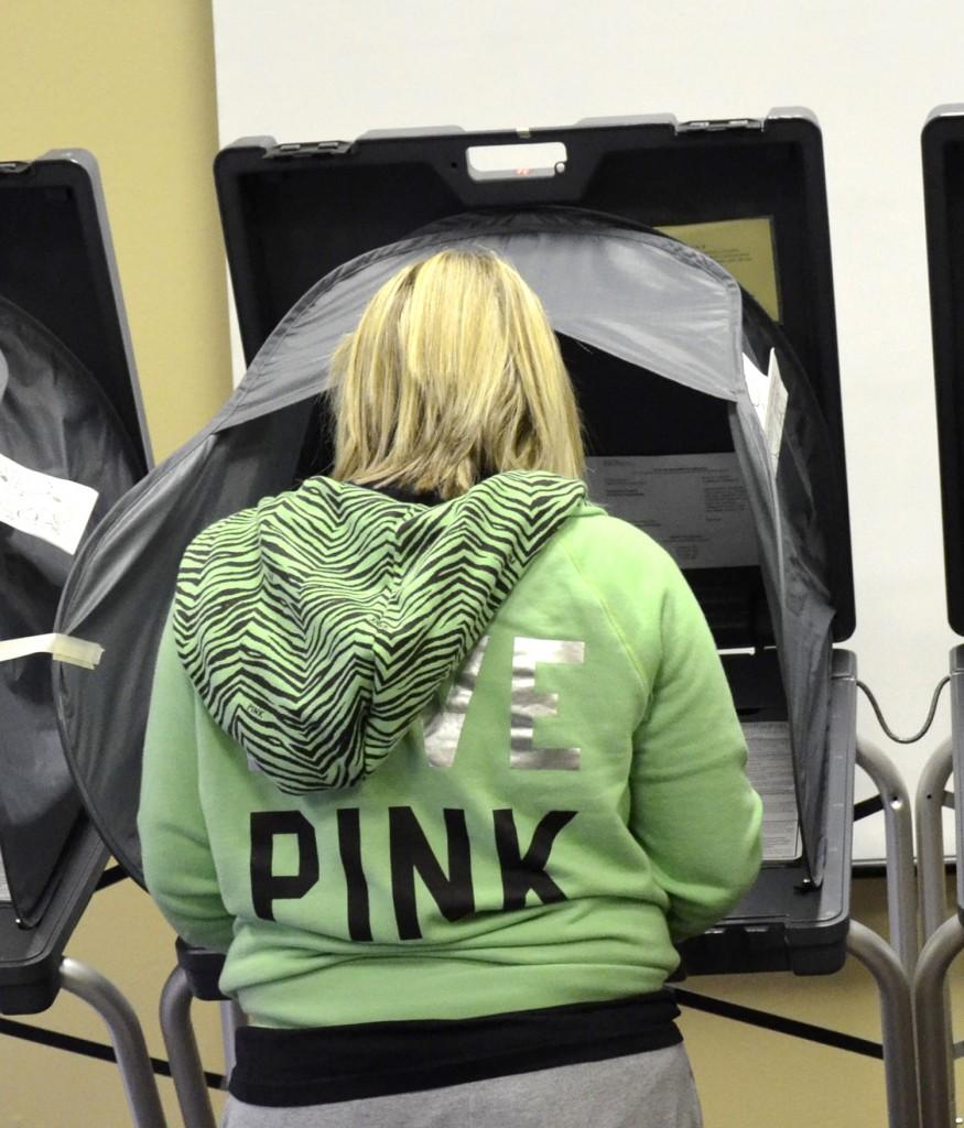Collegian file photo  A student votes on campus during the 2012 election.