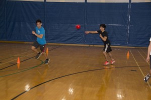Photos by Jason Floyd/The Collegian  NE student Luis Suarez tries to dodge the ball being thrown by NE student David Villanueva during a round of heroball Jan. 24 in the NE Campus gym.