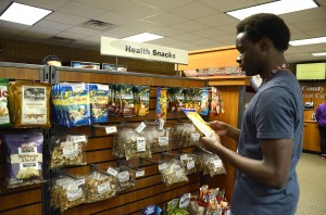 Georgia Phillips/The Collegian  Students can avoid stress by eating healthy, watching their temper, being around people and exercising regularly. Students like Anderson Colemon can purchase healthy snacks in campus bookstores.
