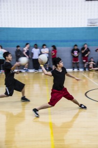 Photos by Jason Floyd/The Collegian  SE students Johnny Vu and Khoa Tran try their best in a dodgeball tournament in the SE gym Jan. 31.