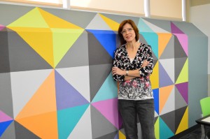 Crystal Chinea/The Collegian  NW student Suzie Leiber was talked out of majoring in art by her family and majored in English though art always played a big role in her life. She has now been recognized as an artist on NW Campus with one of her murals in the new experiential classroom. 