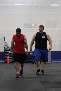 Matt Fulkerson/The Collegian  NW students Chuck Grier and Austin Cropsey do the farmer walk during the NW Lift-A-Thon.