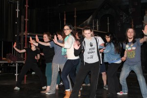 Collegian file photo  Christine Moreno (center, in glasses) and The Good Woman of Szechwan cast rehearse before the performance at the regional festival. 