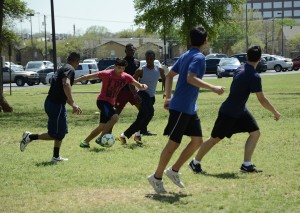 Georgia Phillips/The Collegian  Opponents surround Daniel Villanueva during the soccer tournament on NE Campus April 4. 