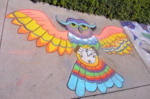 Photos by Brenda Medici/The Collegian  Students get creative and participate in the annual Chalk The Walk competition April 24 on SE Campus. Monica Prashar’s “Wisdom Takes Time” took first place in the competition. 