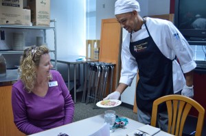 SE dietetic student Eric White serves lunch to accounting associate professor Karen Haun at the culinary arts class’ weekly $5 lunch. The meals are served noon-1:15 p.m. Mondays. Linah Mohammad/The Collegian