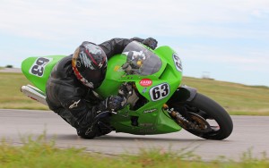 NE Campus instructor Thomas Eimermacher's double life as a motorcycle racer creates a bond with his students.