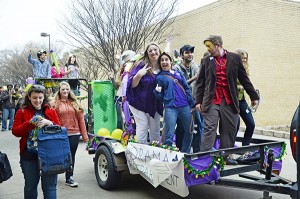 Students gather on their floats and march to the jazzy music. The parade starts in parking lot D and ends at the library. Collegian file photo