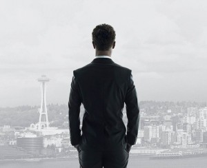 Christian Grey (Jamie Dornan) stares out of his high-rise tower at the Seattle landscape. Grey is a billionaire entrepreneur with a dark past and perverse streak who likes to be in control of all things around him.  Photo courtesy Universal Pictures
