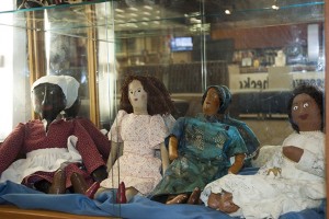 The dolls of Sybil Reddick, mother of English instructor Annette Cole, are on display in the NE library until Feb. 28 as part of Black History Month education exhibitions.  Photo by:Audrey Werth/The Collegian