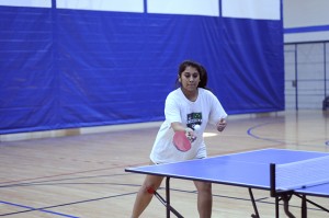 Sarahy Van Den-Dyssel focuses on hitting the ball back in the pingpong tournament on NE Campus. Photos by Stephanie Pauken/The Collegian