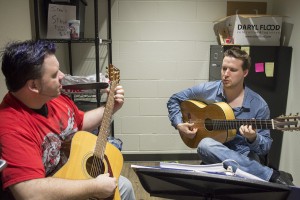 NE music adjunct instructor Mike Morey works with student Scott Wells in a guitar lesson.  Photo by Katelyn Townsend/The Collegian